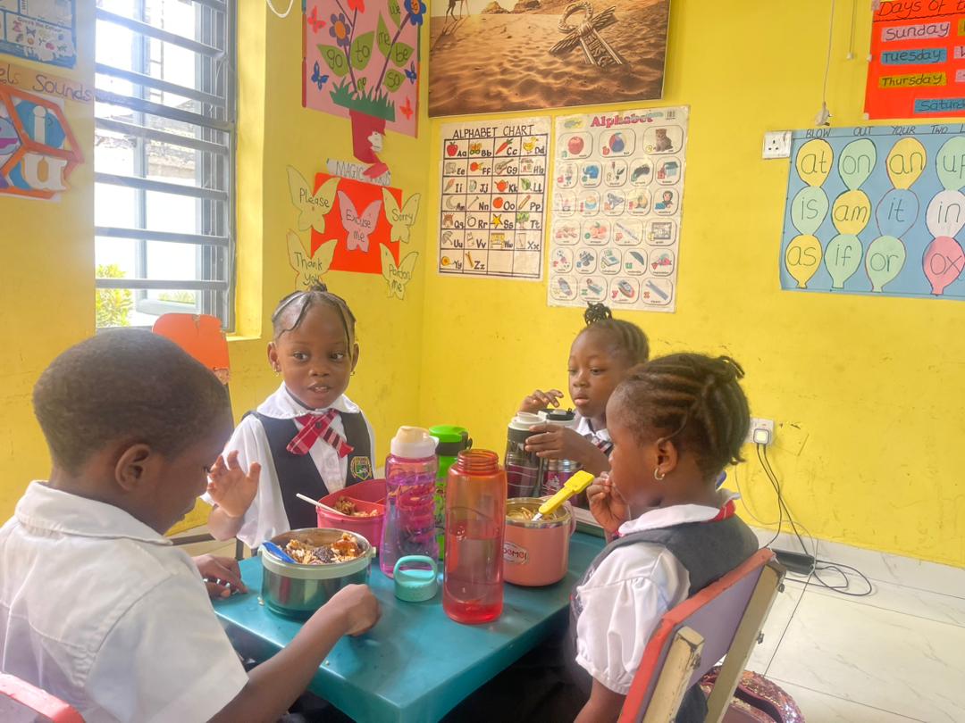 Young students playing in school playground